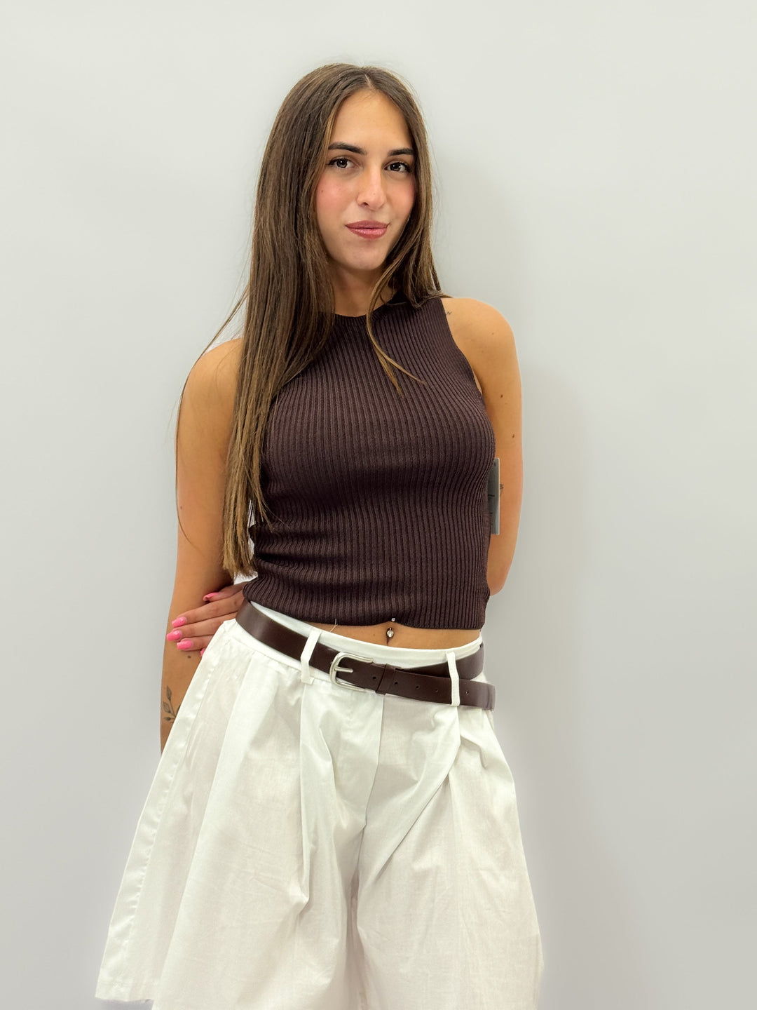 Black Ximena™ tank top by Emma & Rose Cape Town featuring bow details at the back, made of soft maglieria fabric.