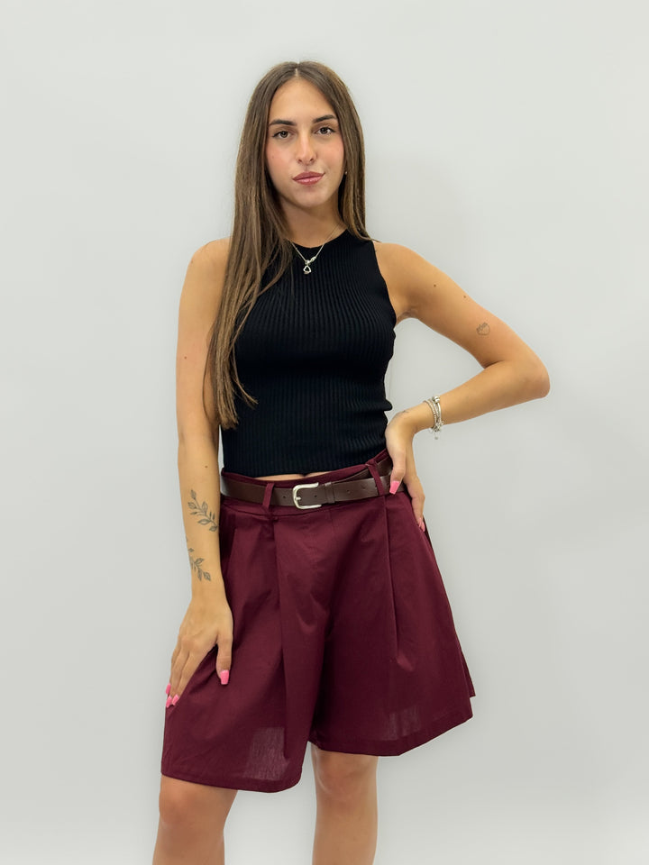 Black Ximena™ tank top by Emma & Rose Cape Town featuring bow back design, made from stylish maglieria fabric.