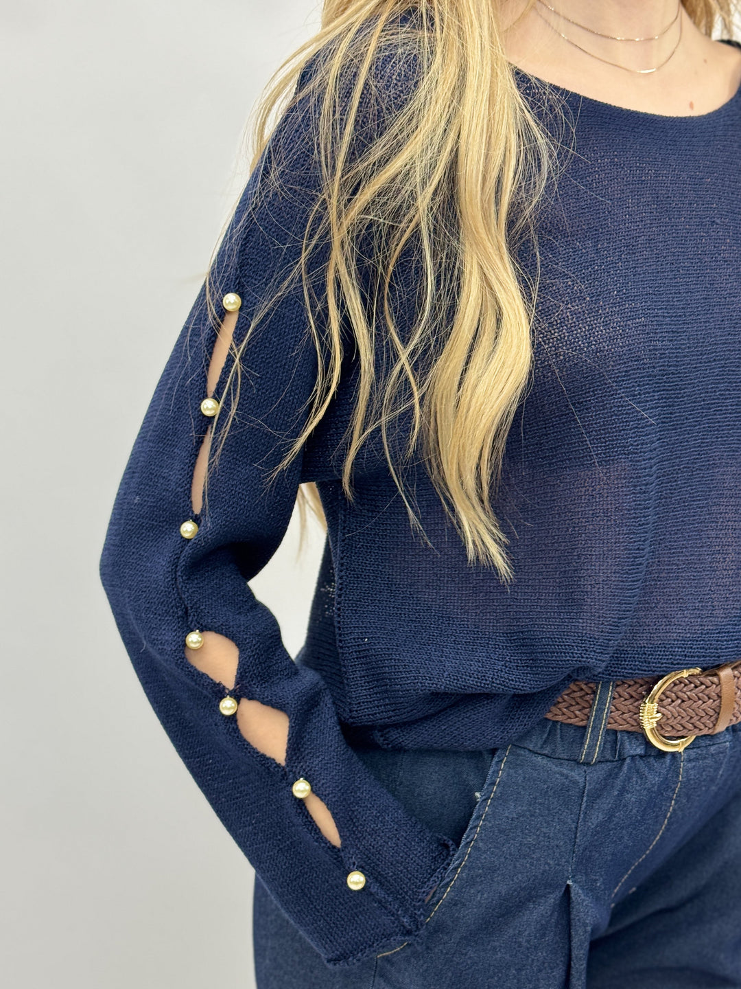 Blue women's cozy sweater from Emma & Rose Cape Town, soft maglieria with a comfortable fit, displayed on a neutral background.