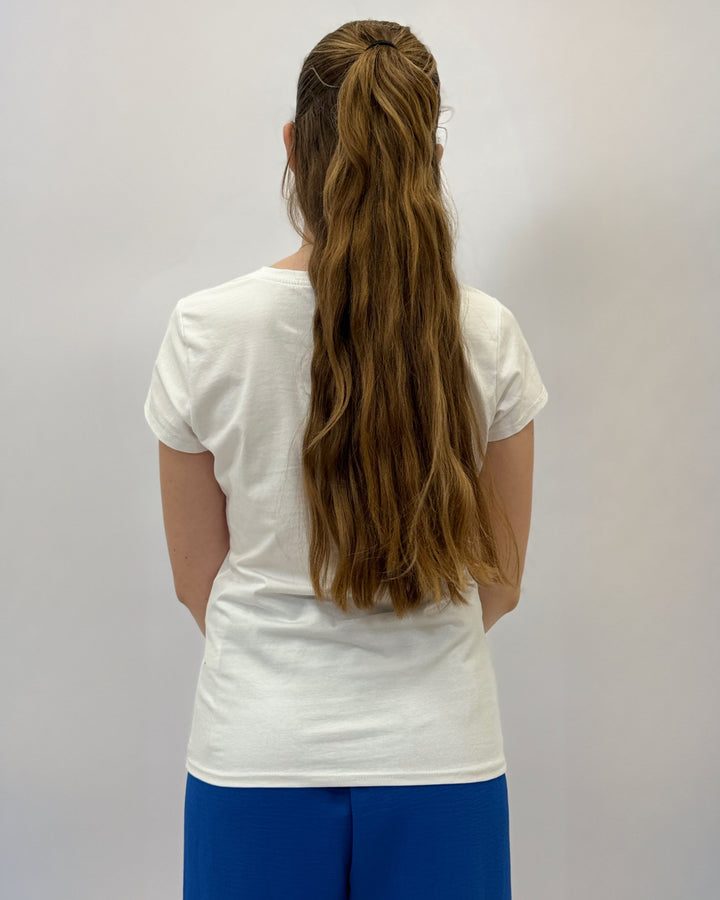 Green Amber™ T-shirt with balloon text design from Emma & Rose Cape Town, showcasing a casual knit style and comfortable fit.