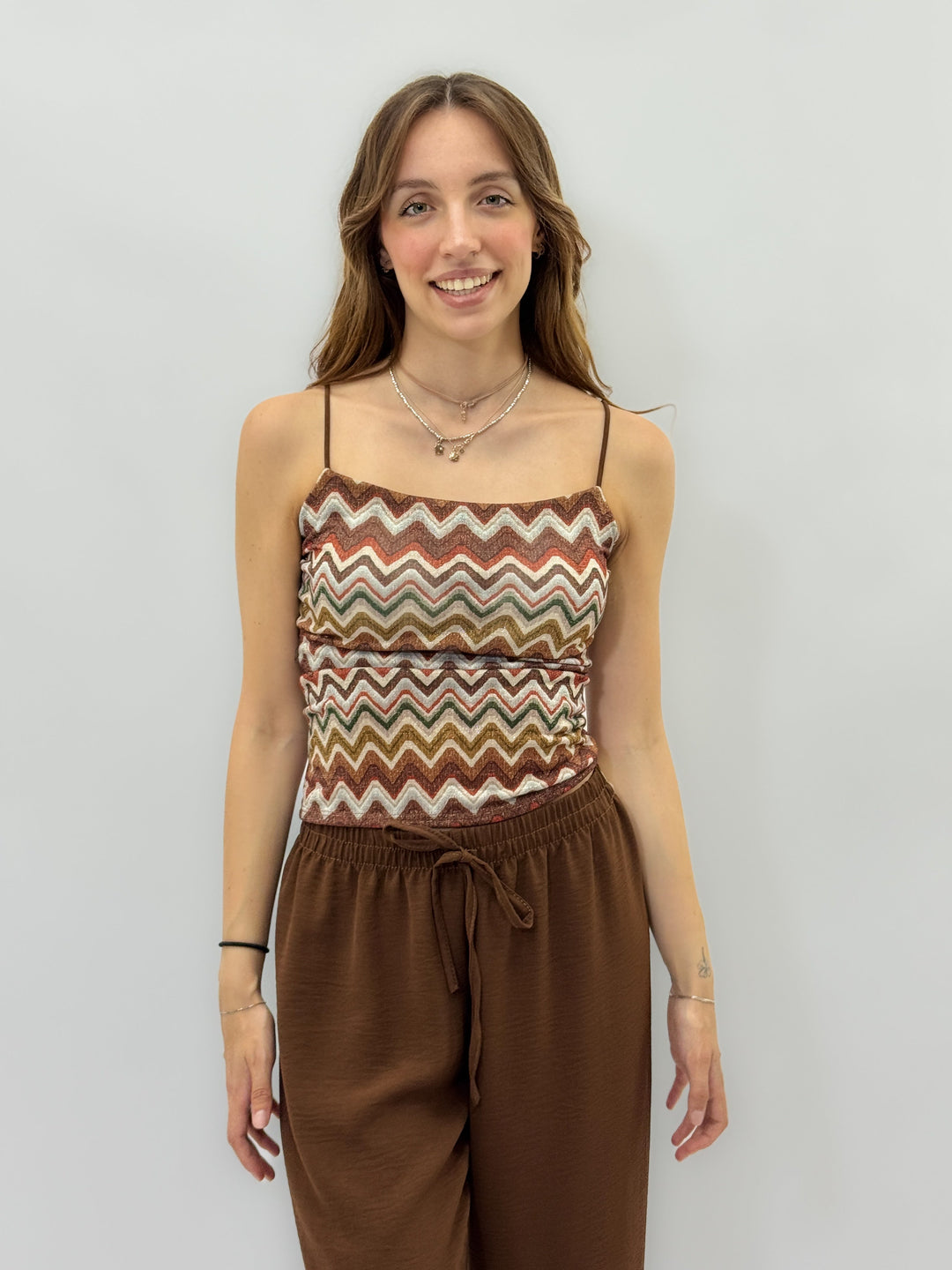 Green Lurex™ patterned top by Emma & Rose Cape Town, stylish maglieria knit with shimmering metallic accents.