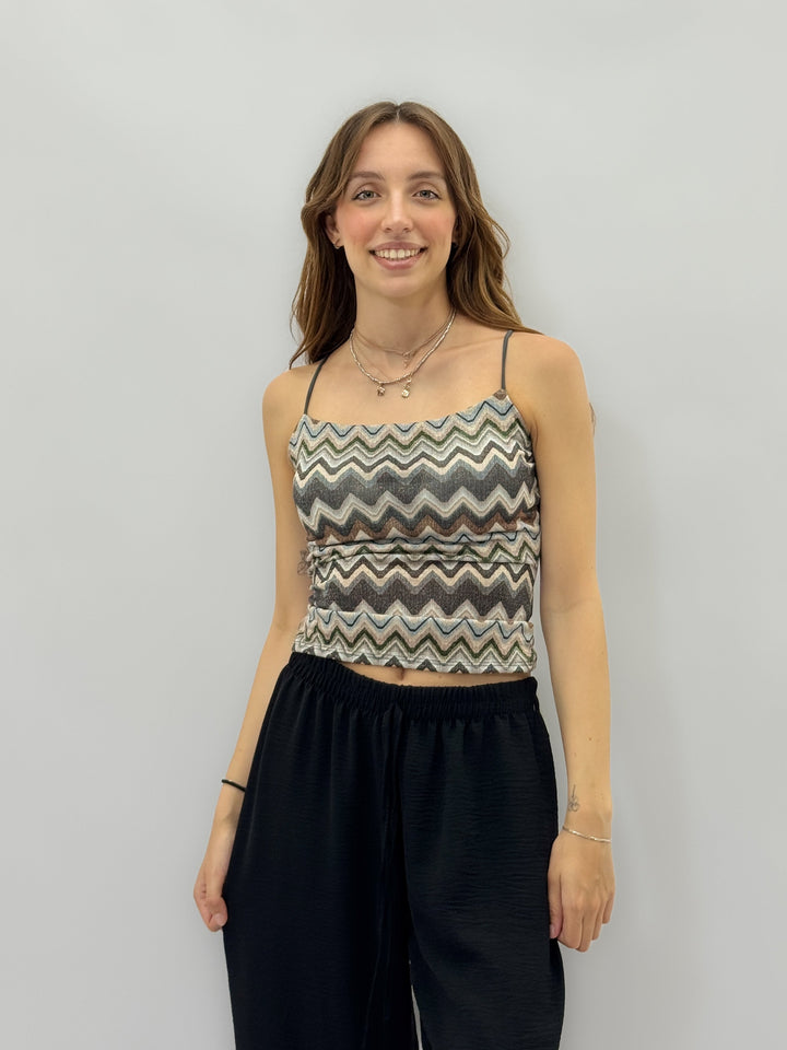 Green Lurex patterned top by Emma & Rose Cape Town, stylish maglieria with shimmering metallic details and intricate design.
