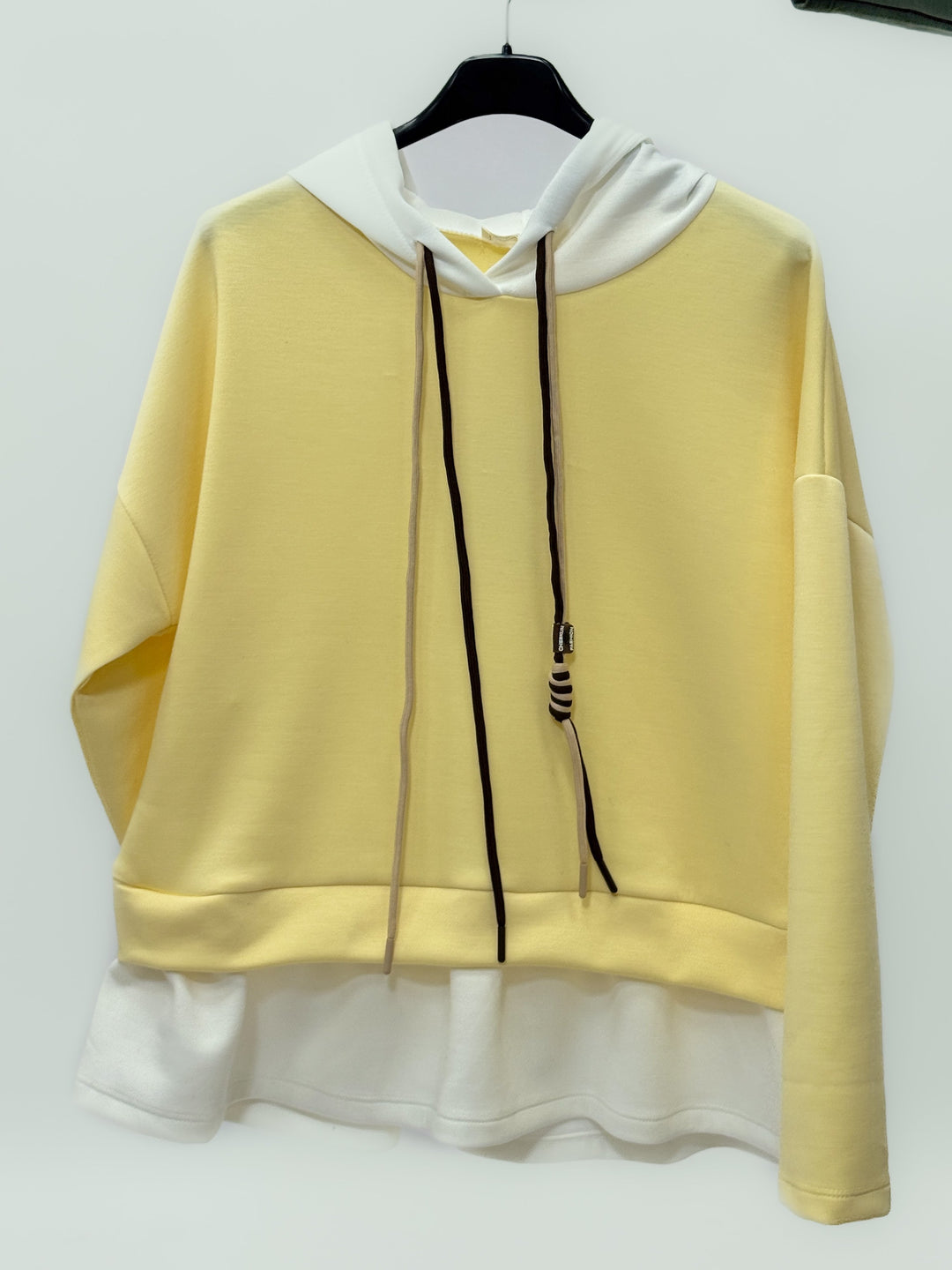 Green Mieke™ hooded sweatshirt by Emma & Rose Cape Town, soft maglieria fabric, casual fit with a hood and long sleeves.