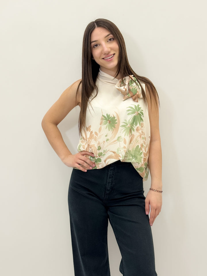 Light blue Bridget™ sleeveless top by Emma & Rose Cape Town featuring a bow detail and soft maglieria fabric.