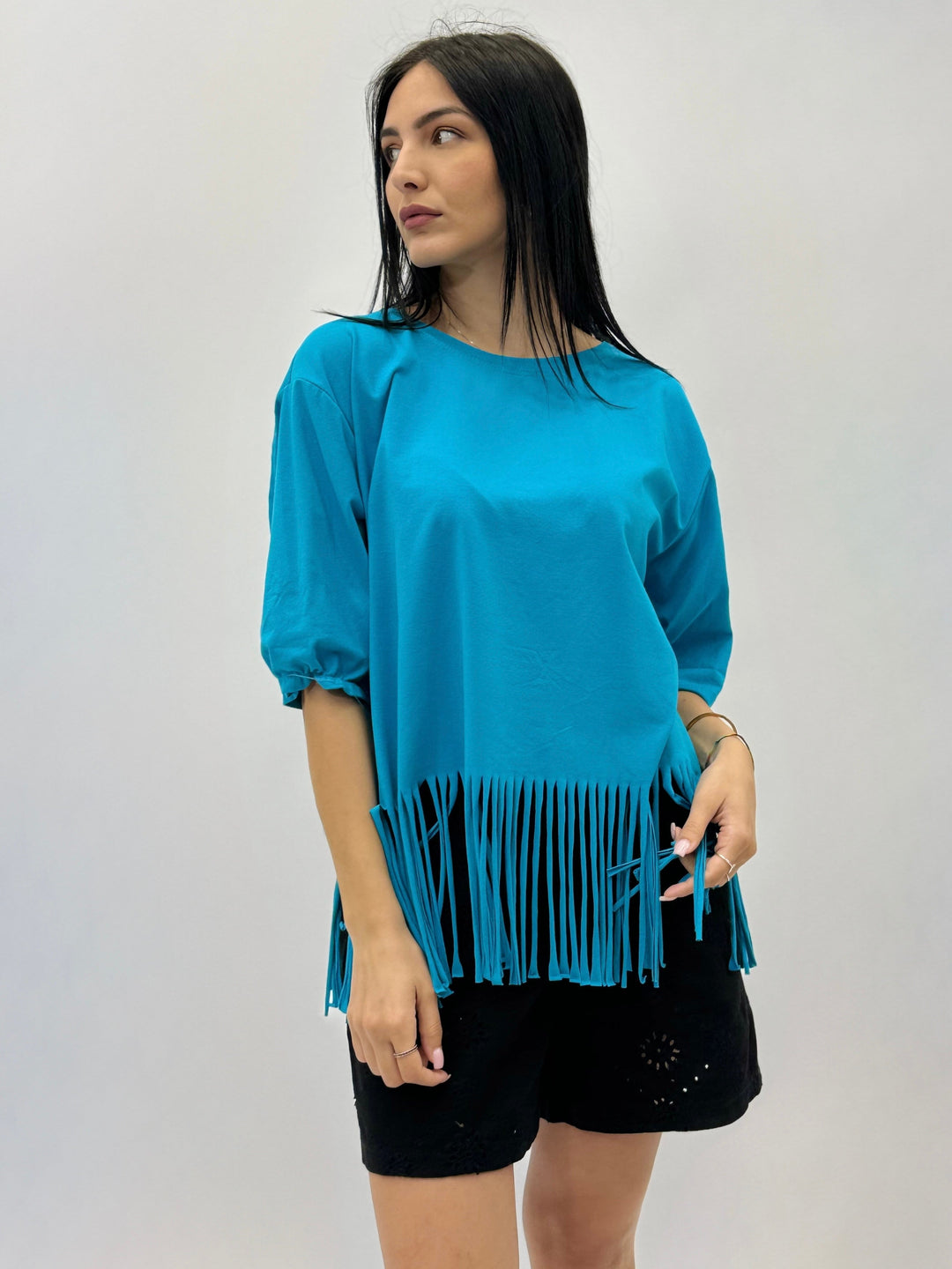 Light blue Plain™ T-shirt with fringes by Emma & Rose Cape Town, featuring a casual fit and stylish fringe details.