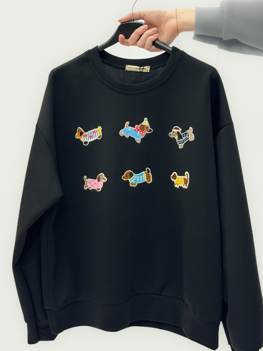 Pink Gretchen Dachshund patch sweatshirt from Emma & Rose Cape Town, featuring a cozy knit neckline with playful Dachshund design.