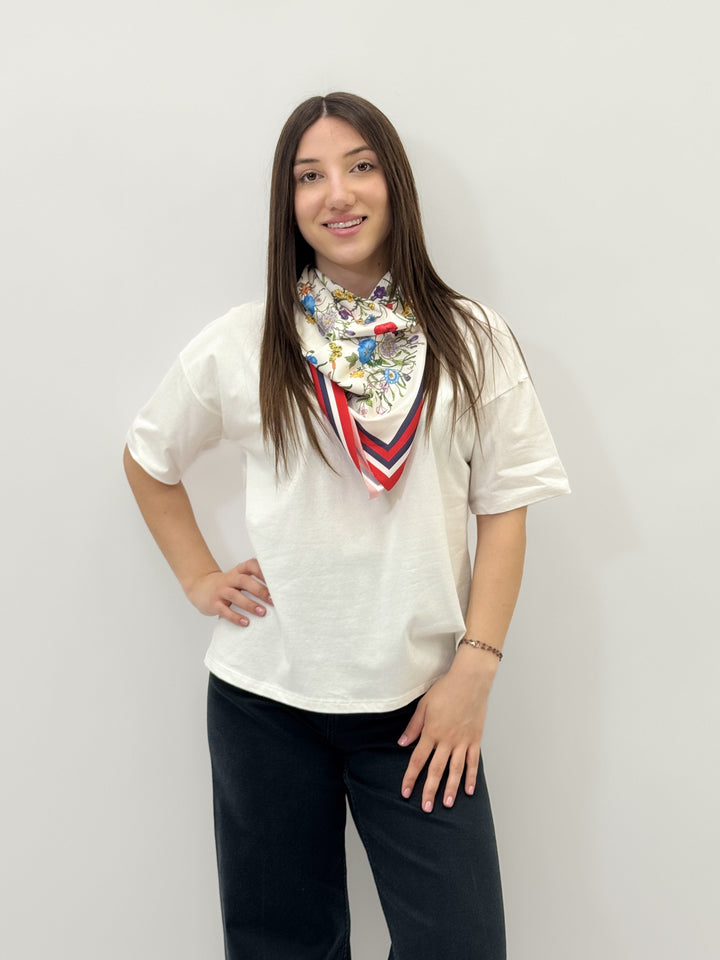 Emma & Rose Cape Town Adele soft luxurious fabrics T-shirt scarf in vibrant red, styled as a cozy, elegant accessory.
