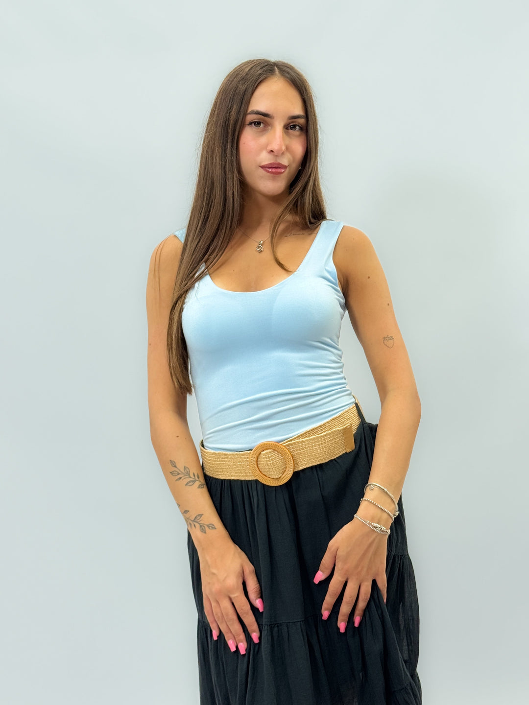 White Veronique™ sleeveless bodysuit by Emma & Rose Cape Town, showcasing a fitted maglieria design with a sleek neckline.