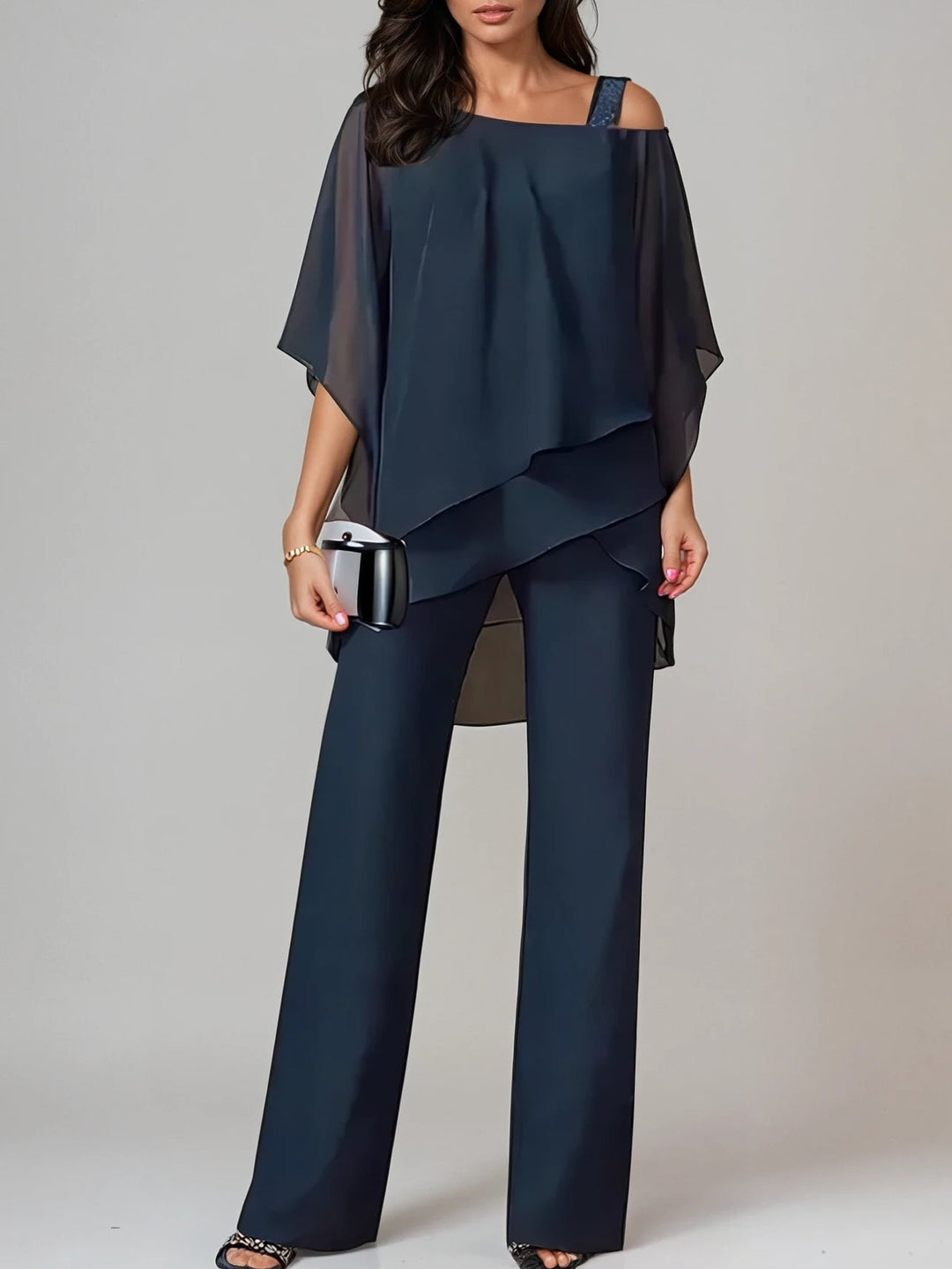 Emma & Rose Cape Town Maren off-the-shoulder flowing suit in white, featuring an irregular design and matching set style.