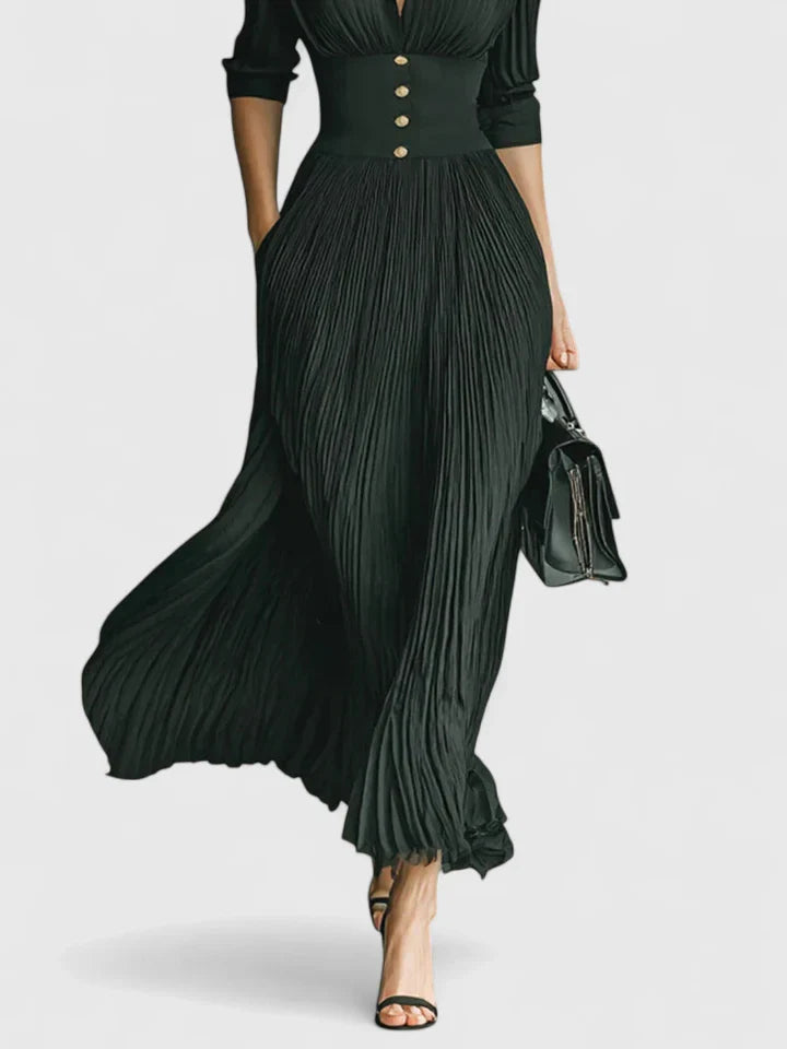 Black Sophyrahh™ Emma & Rose Cape Town elegant maxi dress with flowing fabric and sleeveless design, perfect for upscale occasions.