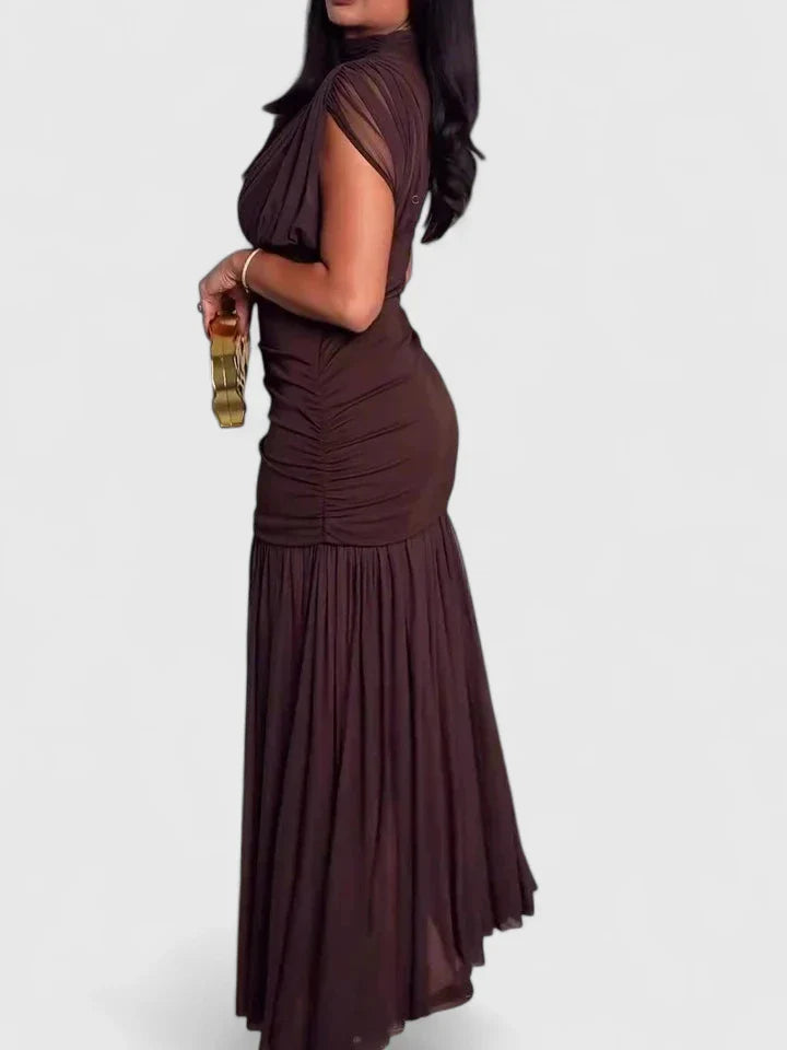 Brown Elyzhera maxi dress by Emma & Rose Cape Town, elegant long dress with flowing fabric and stylish design.