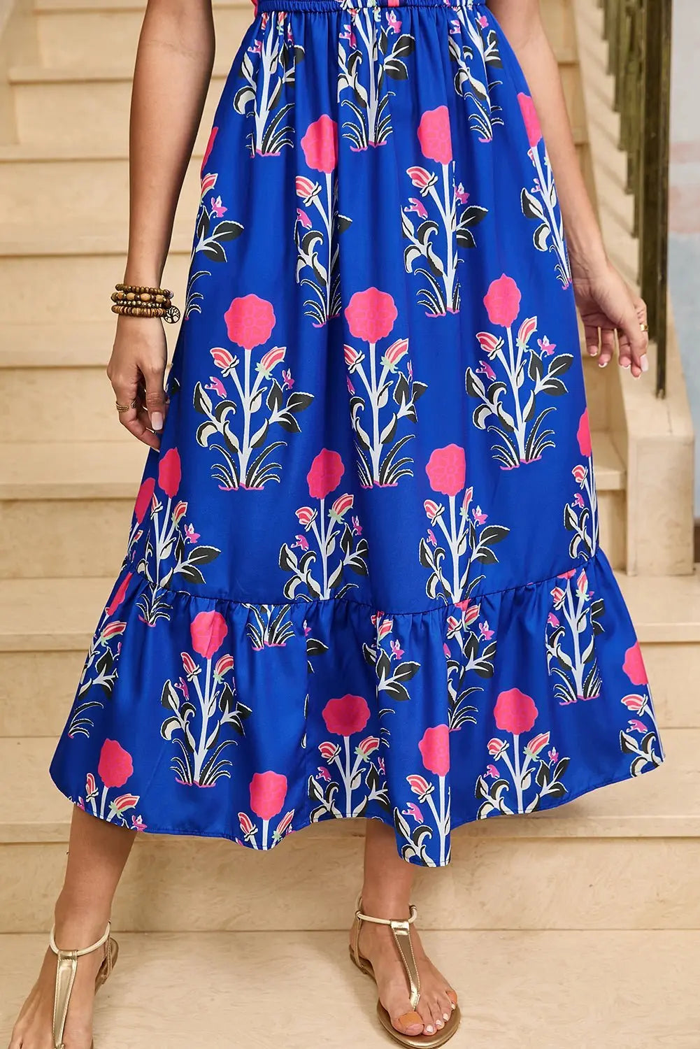 White floral midi dress with ruffle hem and colorful neckline detail from Emma & Rose Cape Town