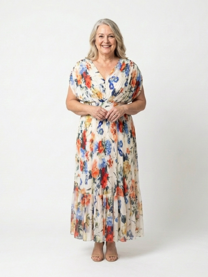 Multicolor Savannah™ pleated floral midi dress by Emma & Rose Cape Town, featuring a flowing design and vibrant pattern.