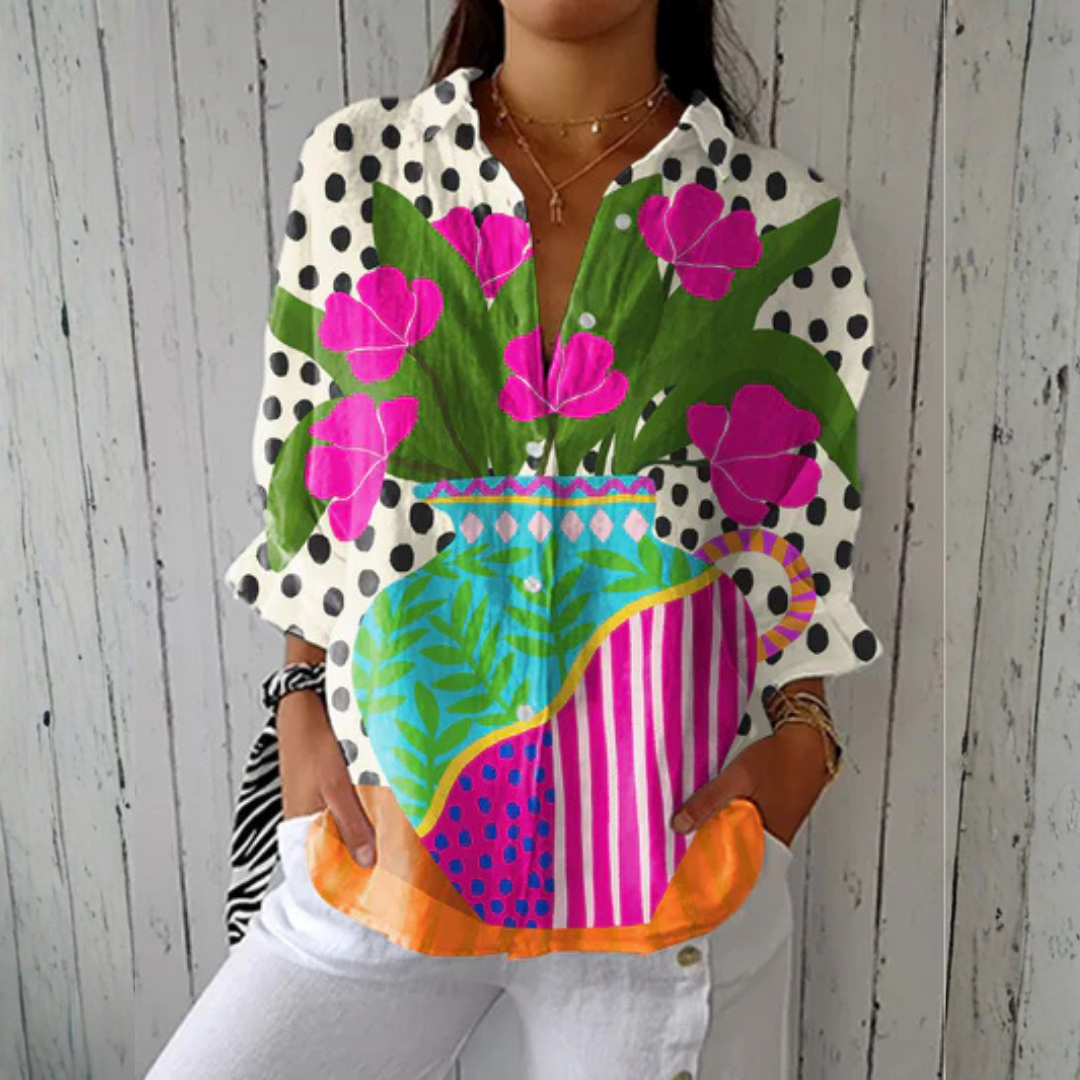Emma & Rose Cape Town Rachel Blooming Vase Blouse in multicolor, showcasing a floral design and lightweight fabric.