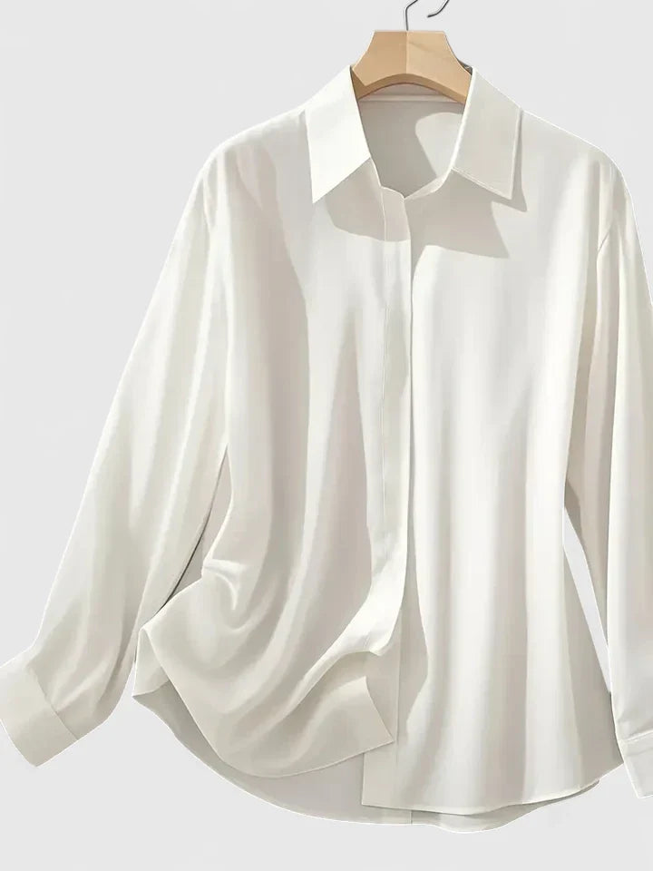 Navy blue Melvaya™ elegant top by Emma & Rose Cape Town, featuring a stylish design and fitted silhouette.