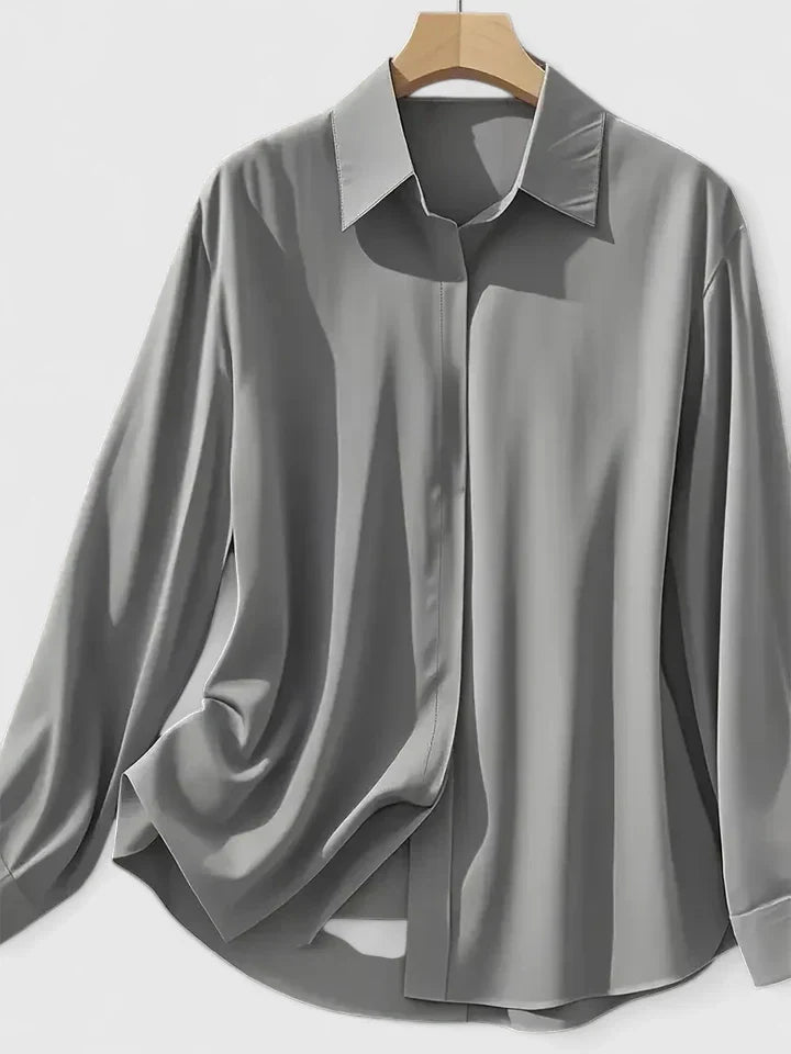 Navy blue Melvaya™ elegant top by Emma & Rose Cape Town, shown in size XS with stylish, fitted design.