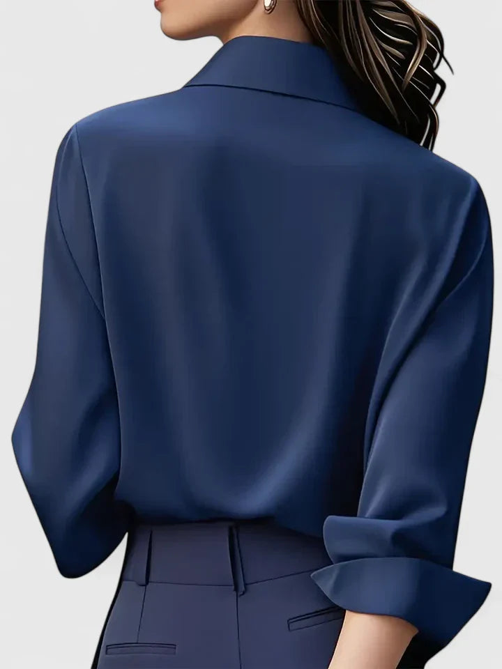 Navy blue Melvaya™ elegant top by Emma & Rose Cape Town, shown in XS size, with stylish design and soft fabric.