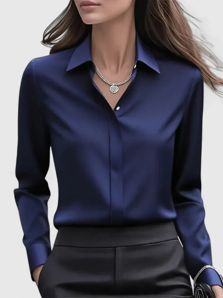 Navy blue Melvaya™ elegant top by Emma & Rose Cape Town, shown in size XS with a stylish, fitted design.