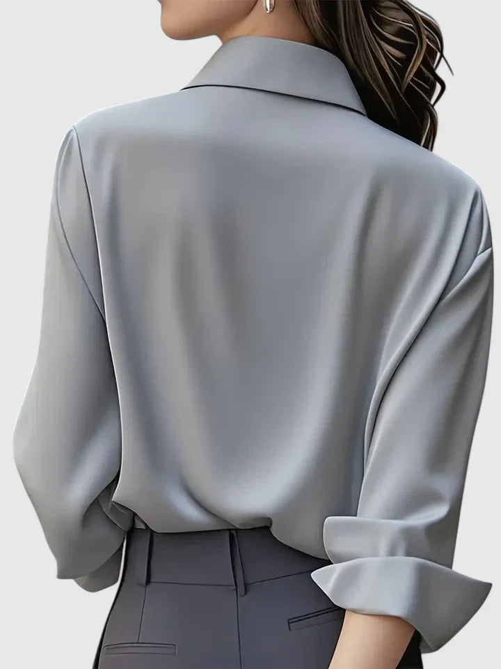 Navy blue Melvaya™ elegant top by Emma & Rose Cape Town, shown in XS size with a fitted style and sleek design.