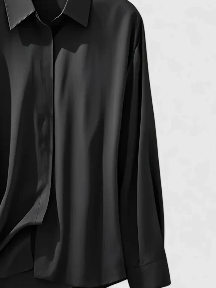 Navy blue Melvaya™ elegant top by Emma & Rose Cape Town, shown in size XS, featuring a stylish, fitted design with a round neckline.