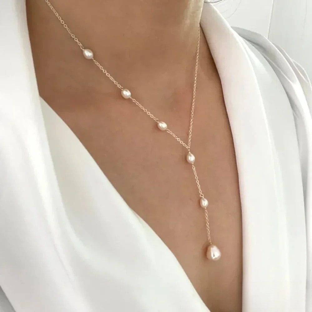 Emma & Rose Cape Town Fleur Vintage Pearl Necklace Pendant featuring a delicate pearl and intricate design.