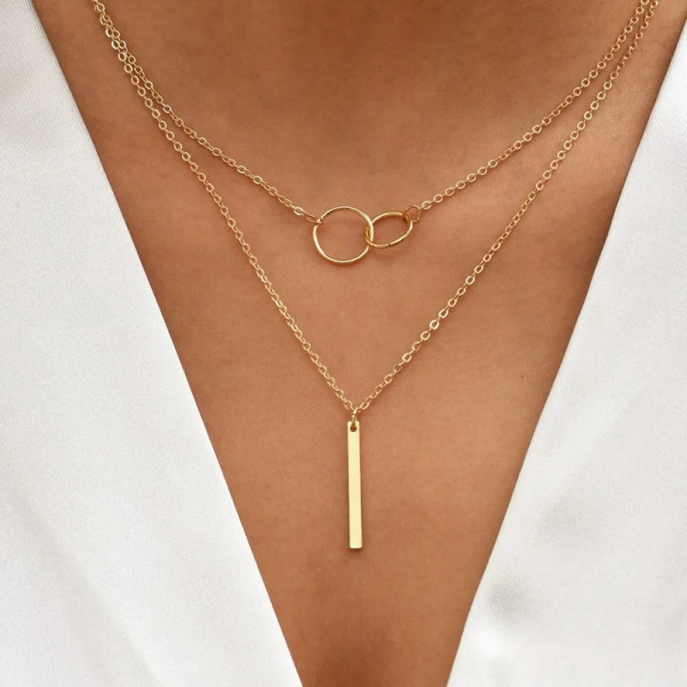 Retro™ Double Circle Pendant Necklace by Emma & Rose Cape Town, stylish gold-tone jewelry with layered circle designs.