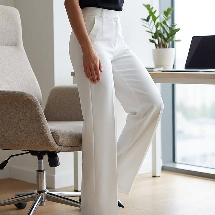 Black women's suit pants from Pantalones™ by Emma & Rose Cape Town, featuring tailored fit and professional style.