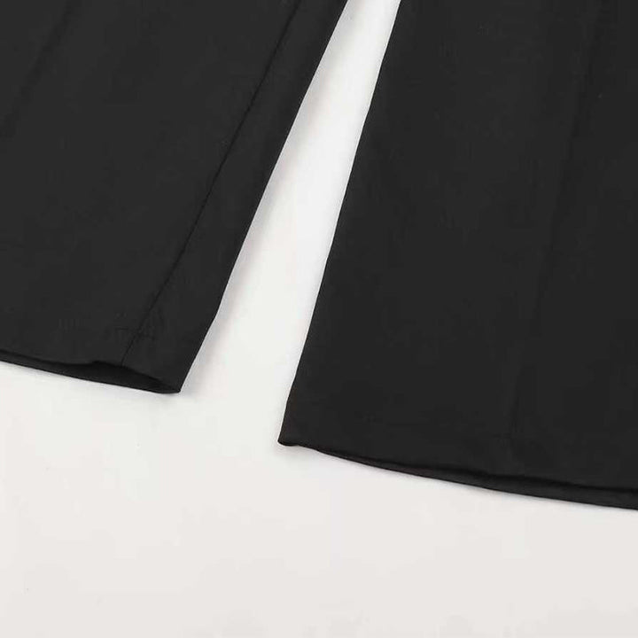 Black women's tailored suit pants from Pantalones™ by Emma & Rose Cape Town, featuring a sleek, professional fit.