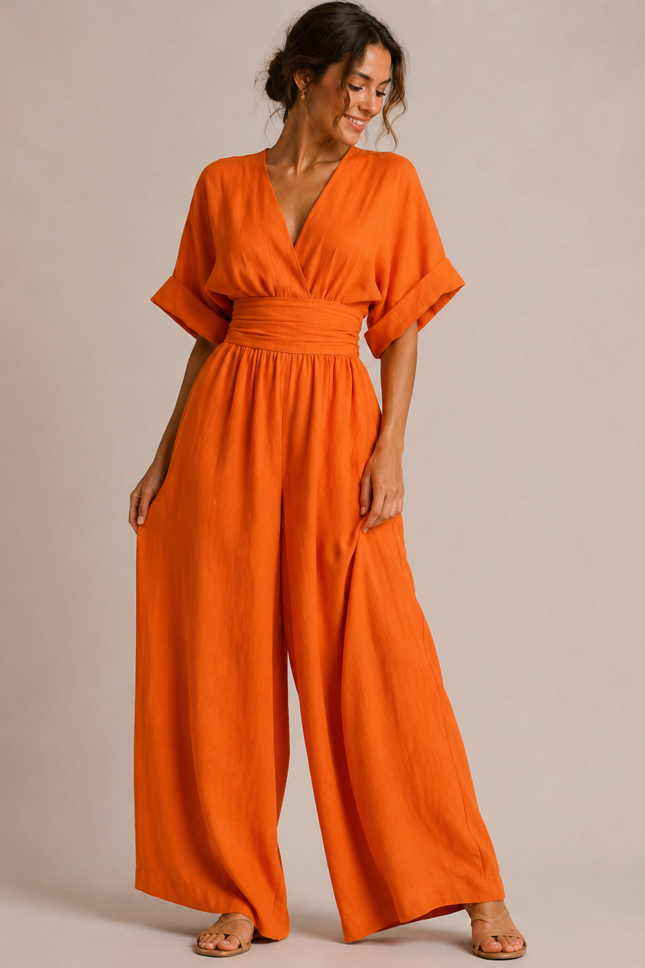 Olive green VIVIENNE Patricia jumpsuit with three-quarter sleeves by Emma & Rose Cape Town, shown on a model.