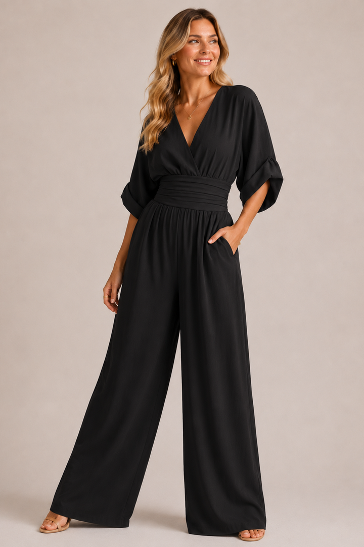 Olive green VIVIENNE Patricia jumpsuit by Emma & Rose Cape Town with three-quarter sleeves, shown on a model.