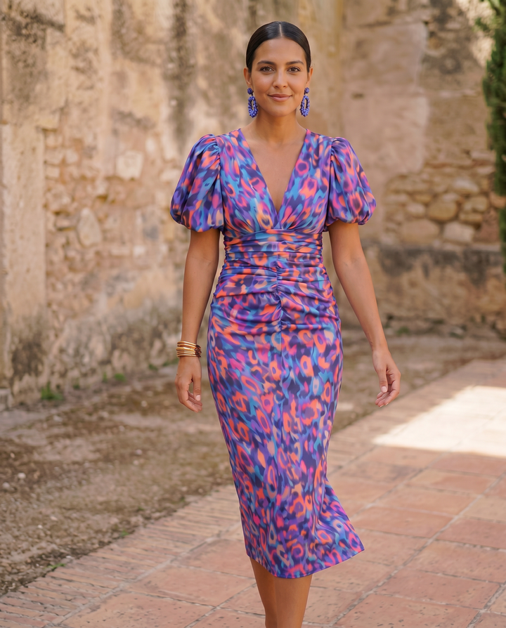 Emma & Rose Cape Town Carla printed midi dress with puff sleeves, orange floral pattern, and flowing silhouette.