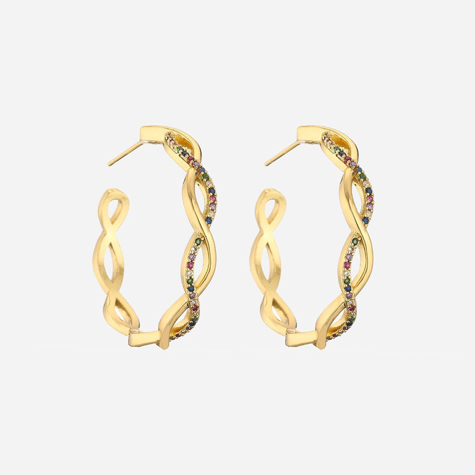 Julenyssa™ wave earrings in 18k gold by Emma & Rose Cape Town, featuring elegant, flowing design and shiny gold finish.