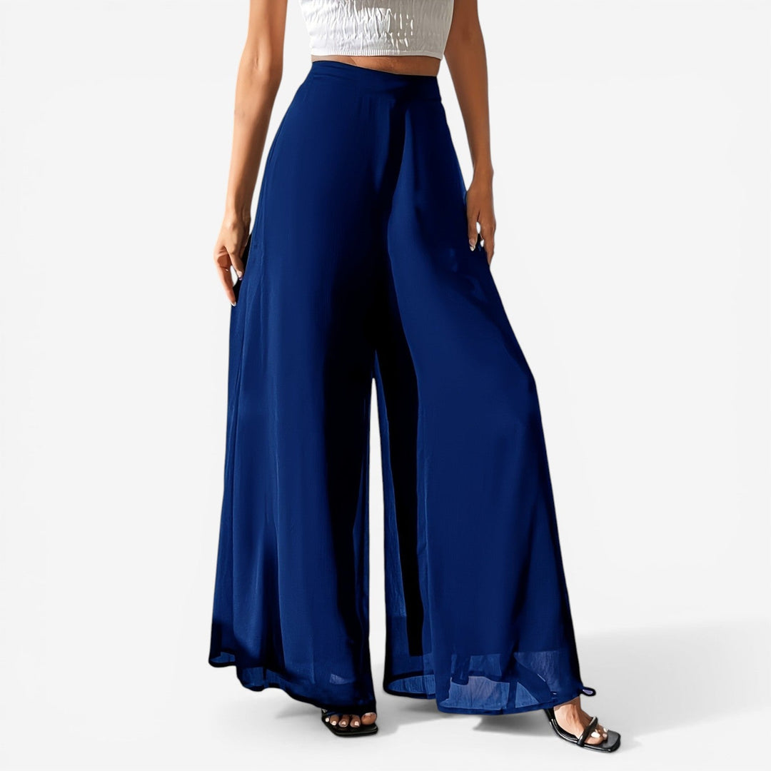Black Maura™ lightweight trousers by Emma & Rose Cape Town, elegant pants with a comfortable fit and sleek design.