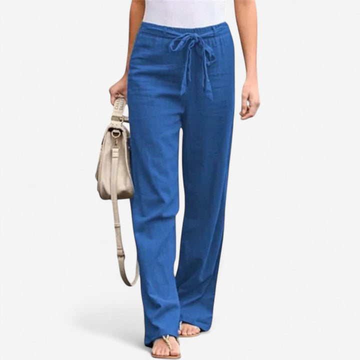 White Arislia™ Chic Trousers by Emma & Rose Cape Town, stylish pants with a tailored fit and modern design.