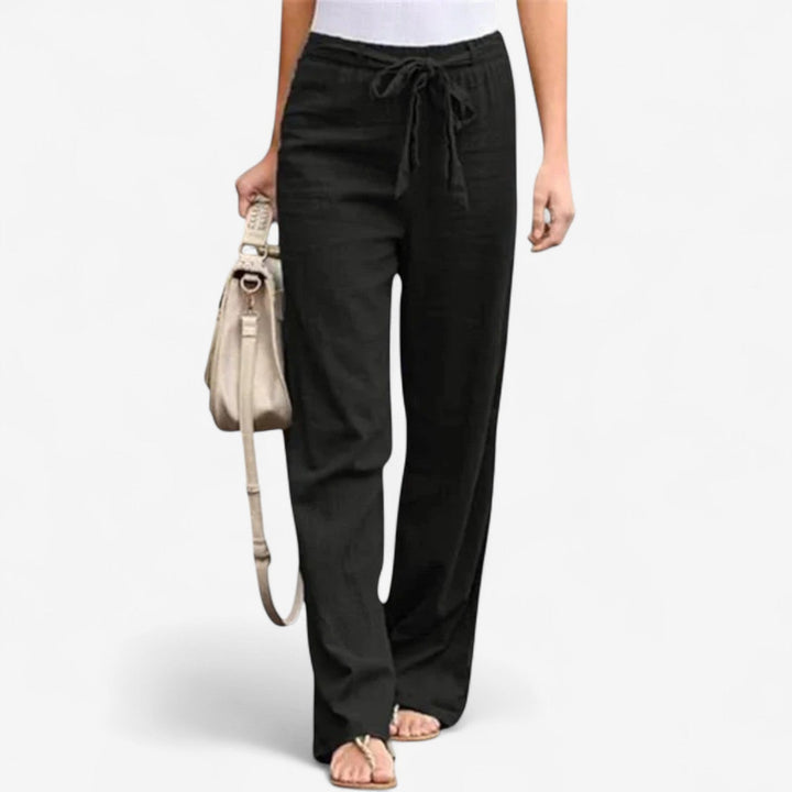 White Arislia™ Chic Trousers by Emma & Rose Cape Town, stylish pants with a tailored fit and modern design.