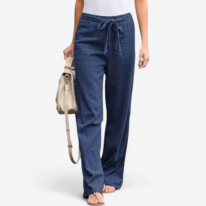 White Arislia™ Chic Trousers by Emma & Rose Cape Town, stylish pants with a tailored fit and modern design.