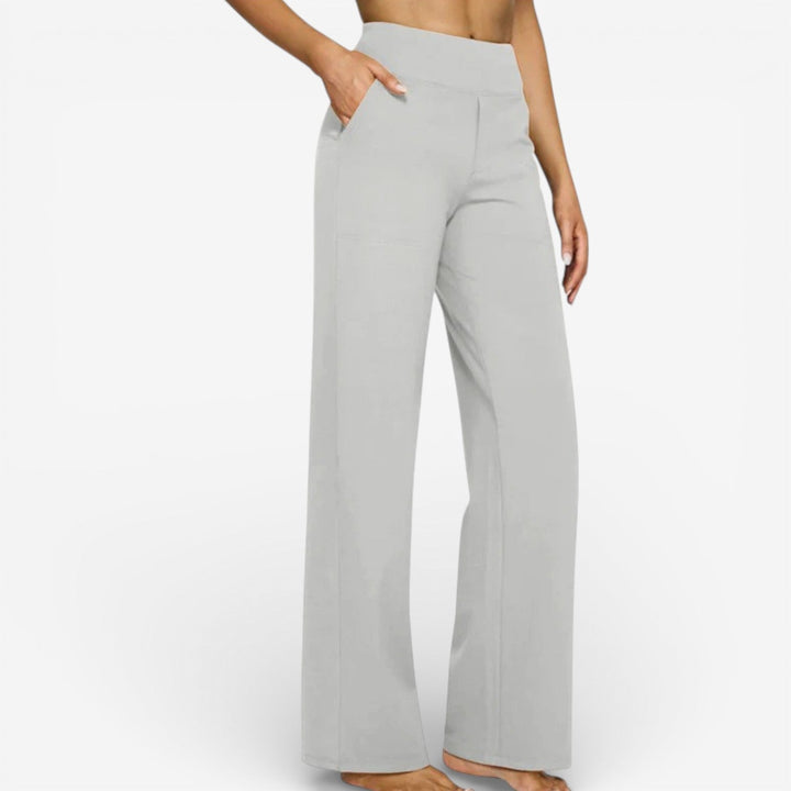 Emma & Rose Cape Town Mazzocchi Fluid Trousers, white pants with a relaxed fit and elegant design, shown on a model.