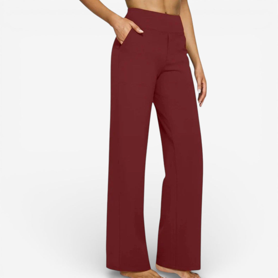 White Mazzocchi™ Fluid Trousers by Emma & Rose Cape Town, stylish pants with a relaxed fit and smooth fabric.