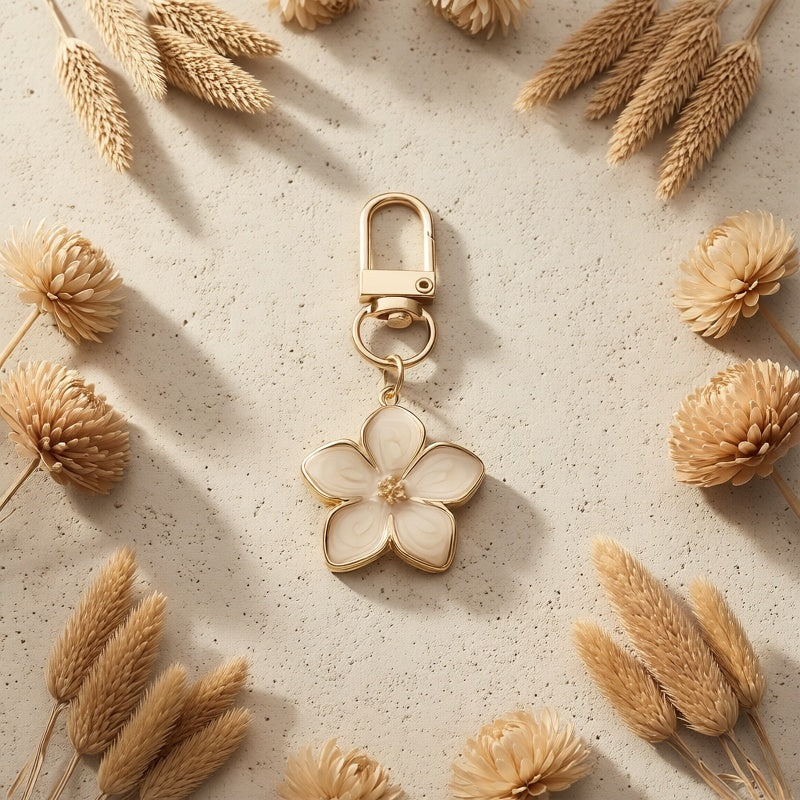 Pink Daisy Trendy Backpack Hanger by Emma & Rose Cape Town hanging from a backpack, featuring a floral design and compact style.