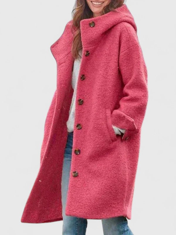 Emma & Rose Cape Town Camerislyn™ elegant pink coat, stylish and tailored, displayed on a hanger.