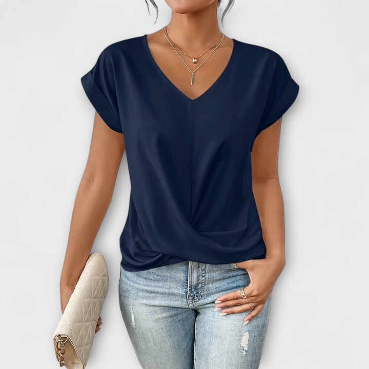 Pink Carlinda™ Elegant V-neck Top by Emma & Rose Cape Town, showcasing a stylish neckline and soft fabric.