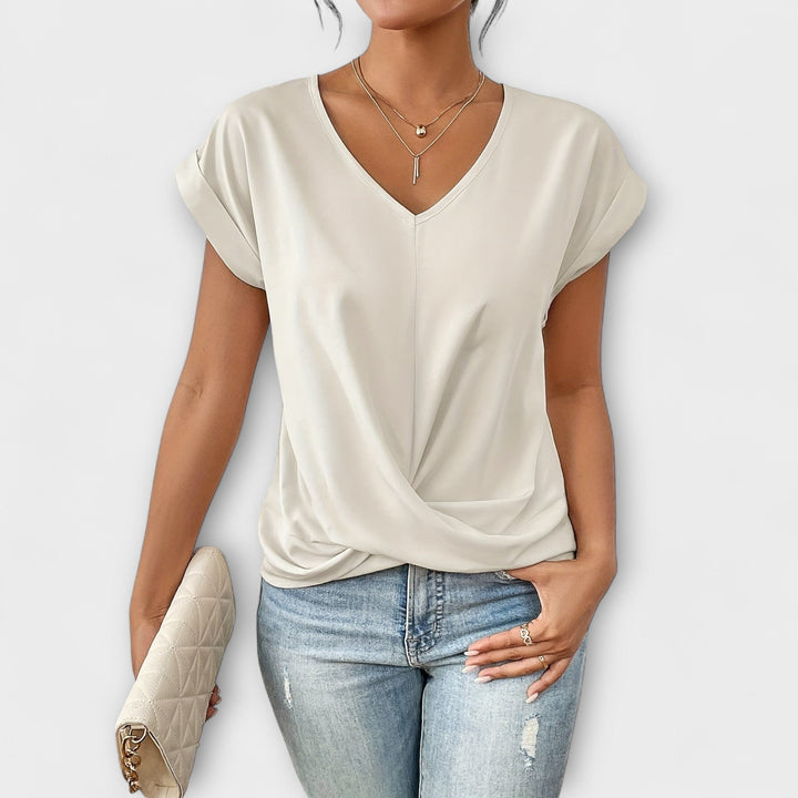 Pink Carlinda™ Elegant V-neck Top by Emma & Rose Cape Town, featuring a stylish V-neck design and soft fabric.