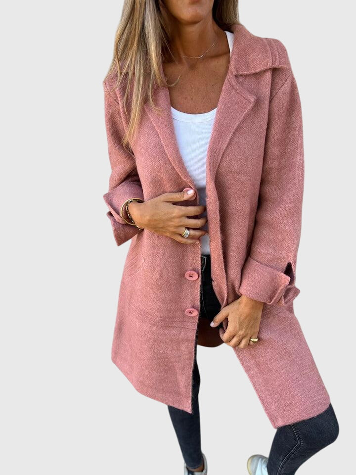 Pink blazer buttons from the Lisa™ collection by Emma & Rose Cape Town, close-up showing detailed metal fasteners and design.