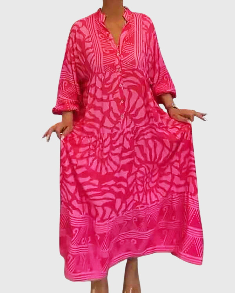 Pink Mckinley Maxi Dress by Emma & Rose Cape Town with elegant floral print, shown on a model.