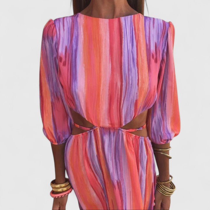 Pink Zeriyahh™ elegant dress by Emma & Rose Cape Town, showcasing a flowing fabric and stylish design.