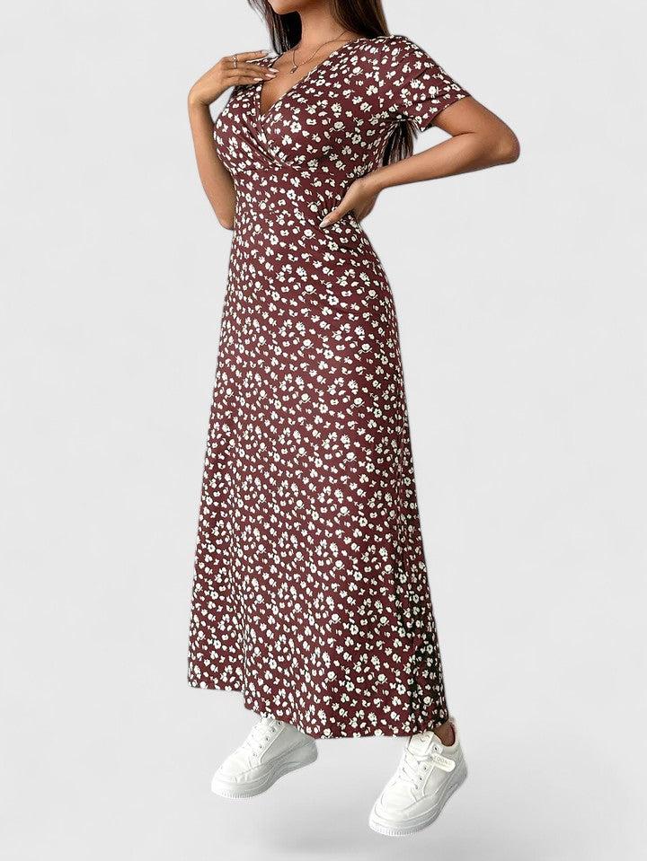 Pink Yulivette™ maxi dress by Emma & Rose Cape Town, featuring elegant design and flowing fabric, shown on a model.