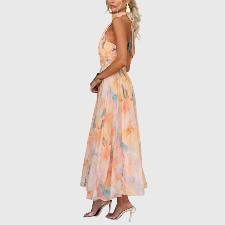 Emma & Rose Cape Town Halter Maxi Dress featuring a flowing silhouette and elegant design in vibrant fabric.