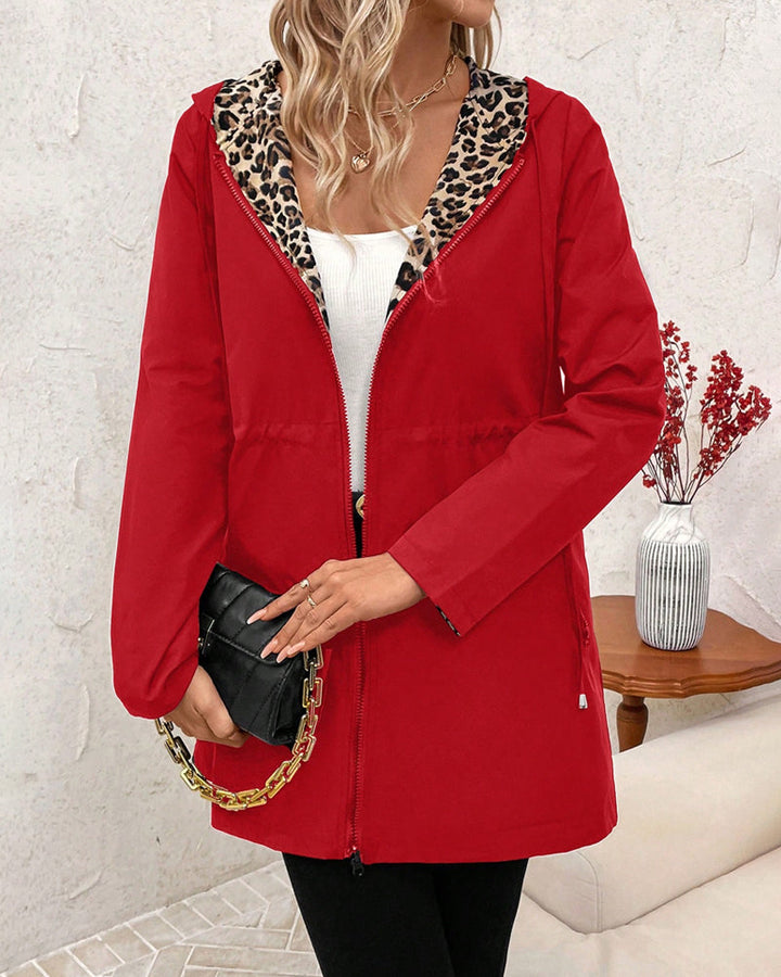 Red Amy™ elegant coat by Emma & Rose Cape Town, showcasing a stylish tailored design with a classic collar and front buttons.