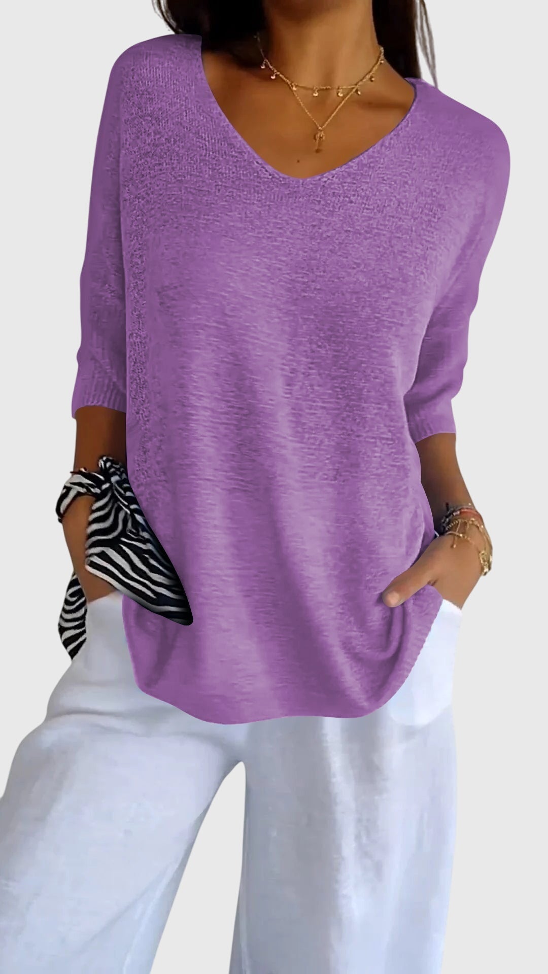 Red Cassandra™ Elegant V-neck Top by Emma & Rose Cape Town, featuring a stylish V-neck design and lightweight fabric.