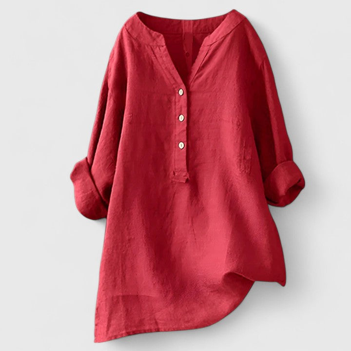 Red Larienne™ elegant button-front shirt by Emma & Rose Cape Town, shown on a model, featuring a classic collar and tailored fit.